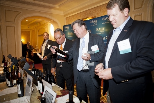 Steve Torgeson of U.S. Bank browsing the silent auction's wine offerings (Whitney Legge Photography)