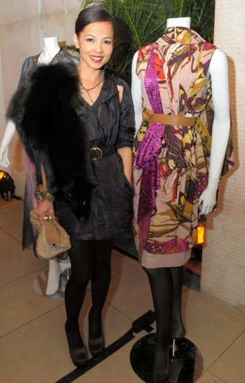 Designer Thuy Diep poses with her contribution to the silent auction. (Elsa Ruiz/Asia Society)