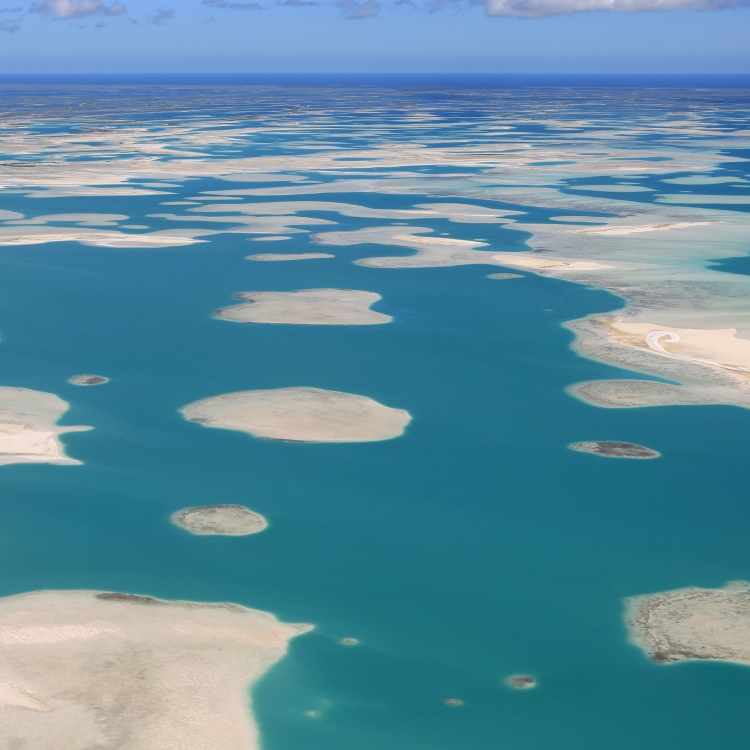 Aerial view of the lagoons of Kiritimati, also known as Christmas Island, part of the Republic of Kiribati in the central Pacific Ocean.